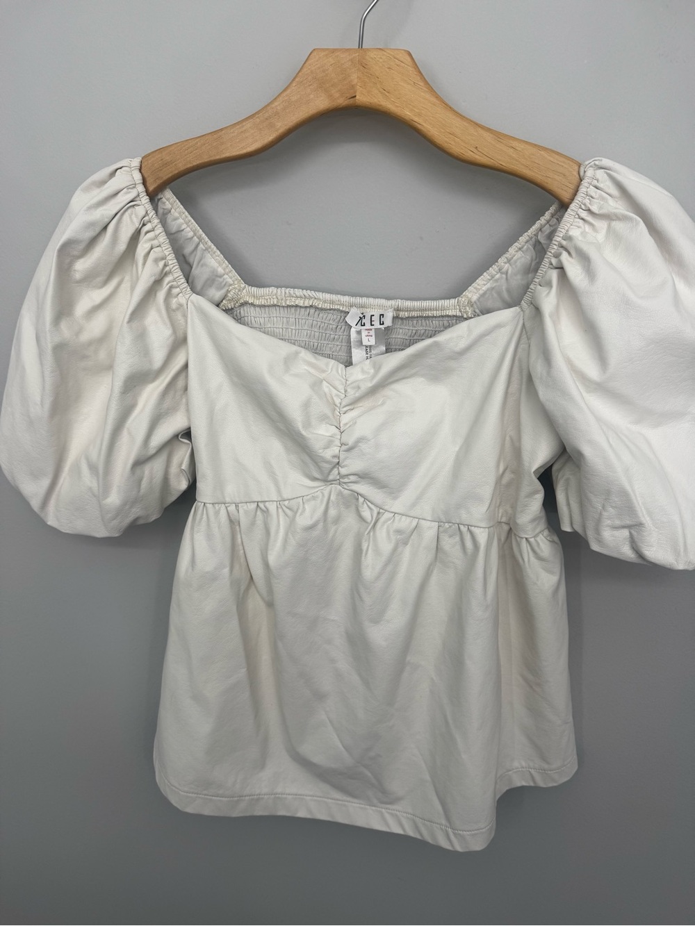 Off-White Puff Sleeve Peplum Top faux leather